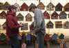 Daniel Filion, left, of Tulsa, Okla., talks Thursday with Rick Hall of Grand Lake, La., about birdhouses during the War Eagle Arts and Crafts Fair. Thousands of visitors and area residents flocked to the War Eagle area Thursday for the opening of the craft fairs.
