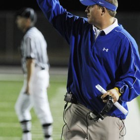Jonathan Brewer, a former Rogers quarterback and assistant coach, will be an assistant coach for Harrison next season.