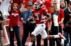 Arkansas wide receiver Joe Adams’ 97-yard punt return for a touchdown Saturday broke a 47-year-old school mark set by Ken Hatfield, who had a 95-yard punt return for a touchdown in the Razorbacks’ 56-7 victory over Tulsa on Oct. 28, 1963. 