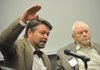 Marty Matlock (left), a professor of biological and agricultural engineering at the University of Arkansas at Fayetteville, and Petrofac founder Ralph Martin, who earned a bachelor’s and master’s degree in chemical engineering from the university, answer questions Friday about the recent Gulf oil spill during a discussion at the UA Bell Engineering building.
