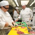  Eric Partain, right, passes Trena Ames on Friday during NorthWest Arkansas Community College’s intr...