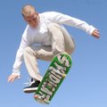  Alex Flowers, 18, catches some blue sky doing an ollie off a ramp Sunday at the Skate Park in Memor...