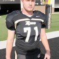 Bentonville junior Michael Crawford started playing football in the ninth grade at offensive tackle....