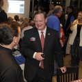 Greg Hines, right, then a Rogers mayoral candidate, and John Murray talk during an election results ...