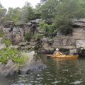 Lincoln Lake’s bluffs and boulders are fun to explore by canoe or kayak. Guided paddling trips will ...