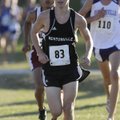 Bentonville’s Will Aenchbacher leads at the 1-mile marker during the 7A West Conference Cross Countr...