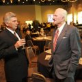  Gov. Mike Beebe, left, speaks with Frank Broyles, former University of Arkansas athletics director,...