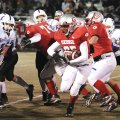  Springdale George’s John Williams looks to turn the corner Thursday against Fayetteville Woodland i...