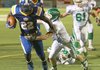 North Little Rock's Altee Tenpenny escapes the grasp of a Van Burne defender on a run for a touchdown in their game at North Little Rock Friday.
