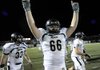 Bentonville offensive lineman Alex Westermeyer celebrates after the top-ranked Tigers’ 55-41 victory over No. 2 Springdale Har-Ber. 