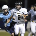 Bentonville’s Drew Edwards races 52-yards down the sideline for a touchdown Nov. 5 during the first ...