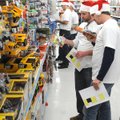  A line of Mars U.S. employees searches through hundreds of toy cars for kids in the Sharing and Car...