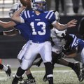  Rogers High School’s Nick Wary passes the ball Friday while hosting Springdale High.
