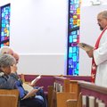  The Rev. Paul Hass leads a special service for those unable to get to church without assistance on ...