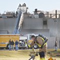  Springdale Capt. David Kissinger turns on a fire hydrant Friday in front of the APEX Tool (formerly...