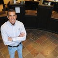 Jon Harrell, president of First Bank, stands in the lobby of the former Signature Bank Building at 3...