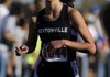 Bentonville’s Tayler Estrada finishes the 7A State Cross Country Championship race Saturday Nov. 6, 2010 at Rogers High School. Estrada finished with a time of 19:06.4 leading the Lady Tigers to a second place team finish with 60 points. Visit http://photos.nwaonline.net/ to see more photos from the event.