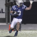 Rogers High School’s Mason Young returns a kickoff against Springdale High on Friday in Mountie Stad...