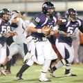 Fayetteville senior quarterback Brandon Allen scrambles against Rogers Heritage during the first hal...