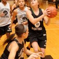 Bentonville senior guard Montana Lewis looks to shoot a layup in the Lady Tigers’ White-Gold
scrimm...