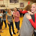 Fayetteville senior point guard Calli Berna, right, gets a congratulatory hug from Fayetteville mark...