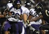 Fayetteville running back Brice Gahagans weaves through the Bentonville secondary during the Bulldogs’ game Sept. 24 against the Tigers in Tiger Stadium in Bentonville.