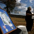 Vicki Roberts of the Marion County Arkansas Heritage Society speaks at a graveside ceremony Thursday...