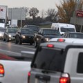 Traffic backs up Friday on the northbound off ramp of Interstate 540’s exit 85 in Rogers. People are...