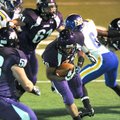 BREAKING THROUGH - Fayetteville sophomore running back Brice Gahagans, center, scores against the No...