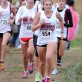 Fayetteville’s Kate Bucknam, center, grimaces as she grinds her way up a hill during the 17th annual...