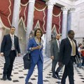 House Speaker Nancy Pelosi of Calif., walks through Statuary Hall on Capitol Hill in Washington, Tue...
