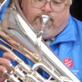  Brian Birks, business manager for the Northwest Arkansas Area Command of The Salvation Army, plays ...