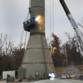  Welding crews from Chicago Bridge and Iron weld together pieces of the new water tower Thursday in ...