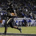  Bentonville running back Tearris Wallace races into the end zone for a touchdown during the first q...