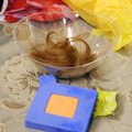 The cut locks of hair were placed in a bowl near Mordechai’s birthday gifts.
