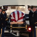Members of the Arkansas National Guard Funeral Honors Team prepare to move the remains of Tech Sgt. ...