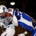 Springdale Har-Ber wide receiver Evan Johnson catches a pass for a touchdown early in the first quar...