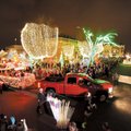 ‘OVER THE HILL WE GLOW’ Floats make their way around the Fayetteville downtown square during the “Ov...