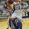 Fayetteville’s Calli Berna shoots a layup over Greenbrier in the first half of the game Nov. 22 in F...