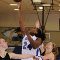 Rogers sophomore Taylor Strickland shoots against West Forks’ Maddy McCorkle, left, and Christy Fral...