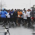 THUNDERING TURKEY TROT Runners leave the starting line Thursday of the annual Springdale Police Depa...