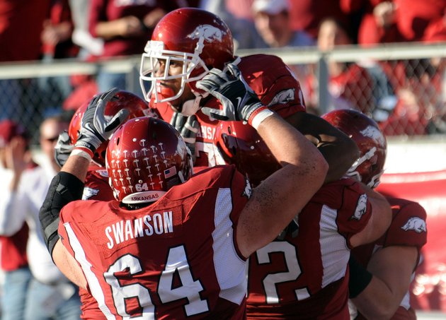 knile-davis-top-center-celebrates-the-razorbacks-first-touchdown-against-lsu-during-the-game-saturday-at-war-memorial-stadium-in-little-rock