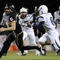 Bentonville wide receiver Austin Molitor turns down field after a catch as Springdale Har-Ber’s Josh...