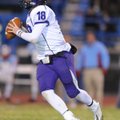 Fayetteville senior quarterback Brandon Allen rolls out to pass through the Fort Smith Southside def...