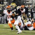 Shiloh Christian’s Garrett Harper runs for a touchdown against Nashville in the first half of the ga...