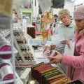 Denise Tremaine, right, and Karen Brown, both of Rogers, shop Friday at The Rabbit’s Lair in downtow...