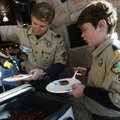 SCOUTING PROJECT Cubmaster Nick Tyburski of Bella Vista and Webelo Scout Michael Pitts, 11, of Bella...