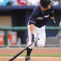 Northwest Arkansas Naturals third baseman Jamie Romak heads for first during the first inning of pla...