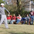 Fans watch as Marcus Hinson pitches Saturday during the annual Gobble Whiffle Ball Classic in Rogers...