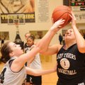 Junior guard Niki Wilson, left, blocks a shot by senior post Jessica Stout in a Lady Tigers Black an...